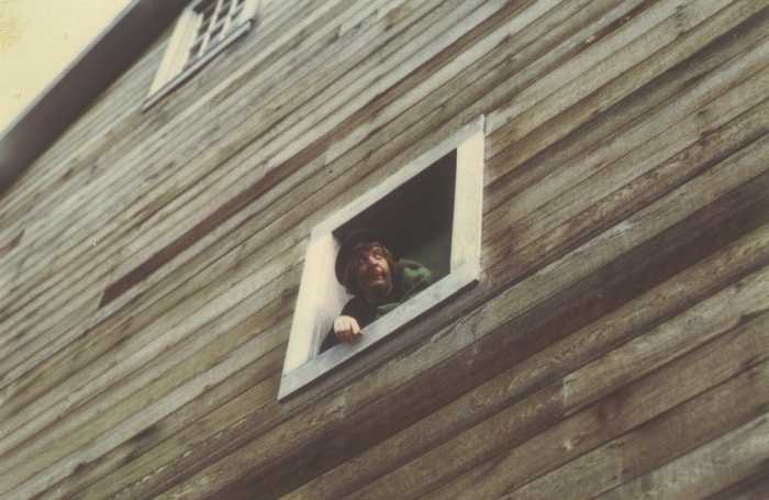 man in window