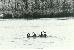 three men on a raft